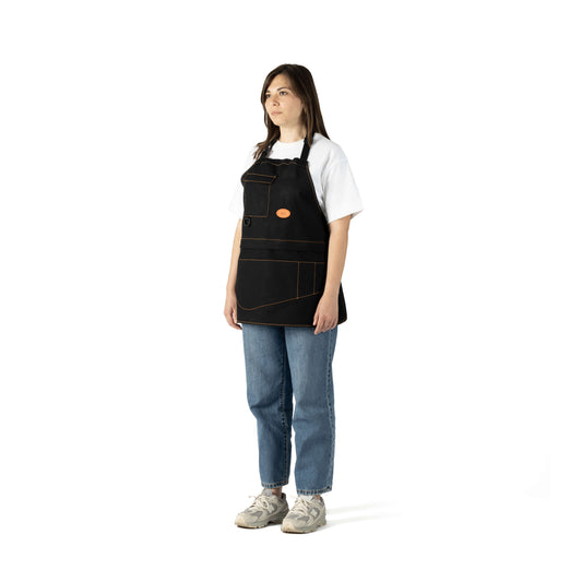 Modular Apron in black organic cotton – front view worn