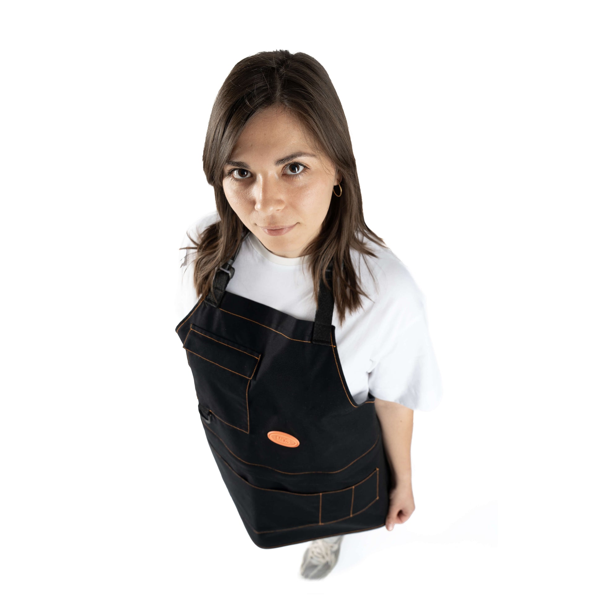 Modular Apron in black organic cotton – top view worn